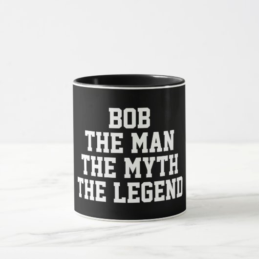 Bob: Mann, Mythos, Legende, schwarz Tasse (Zentrum)