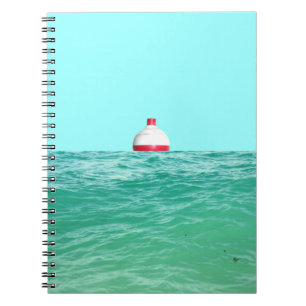 Bobber im Wasser fischen Notizblock