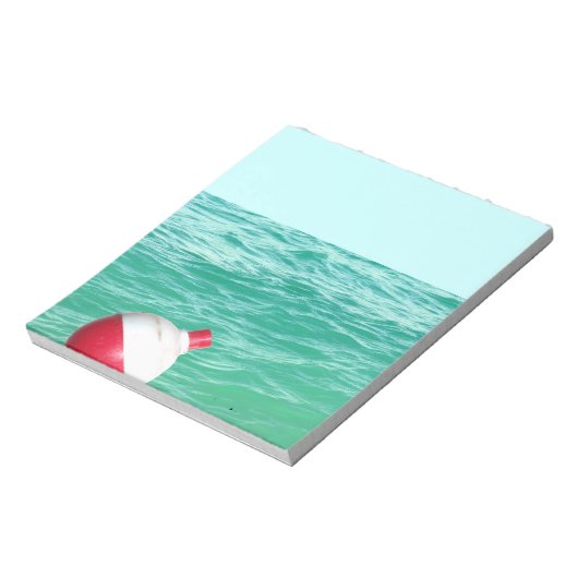 Bobber im Wasser fischen Notizblock (Rotiert)