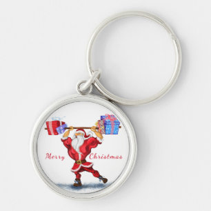 Bodybuilder Santa Claus mit Weihnachtsgeschenken - Schlüsselanhänger