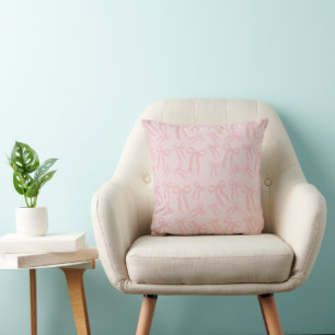 Boho-Rosa-Schleifenmuster auf Puder-Rosa Kissen