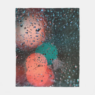 Bokeh-Fotografie von Wassertropfen auf klarem Glas Fleecedecke