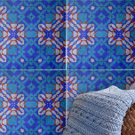 Bold Blue Red White Mosaic Geometric Pattern Fliese<br><div class="desc">Das Design dieser Keramik-Kachel zeichnet sich durch symmetrische Muster aus, die einen harmonischen visuellen Effekt erzeugen. Die Kachel ist mit einer Reihe geometrischer Formen, darunter Diamanten und Sterne, geschmückt, die in einer komplexen, aber ästhetisch ansprechenden Weise verwoben sind. Die Farbpalette wird von verschiedenen Blautönen dominiert, von der coolen Ruhe des...</div>