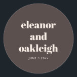 Bold Typography Warm Brown Modern Custom Wedding  Runder Aufkleber<br><div class="desc">This round wedding sticker in brown features clean serif typography with the couple’s names and date on a rich neutral background. A simple,  modern option for sealing envelopes,  favors,  or packaging on your wedding day. Personalize the names and date to match your celebration.</div>