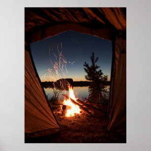 Bonfre near body of water poster