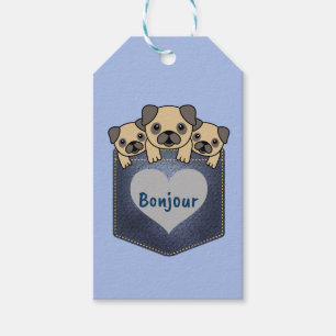Bonjour drei niedliche Mops-Hunde in einem Geschenkanhänger