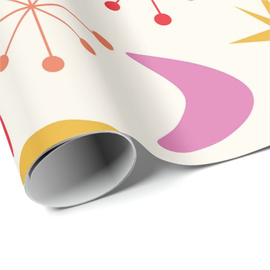 Boomerang Mitte des 20. Jahrhunderts mit farbenfro Geschenkpapier (Rolleneckpunkt)