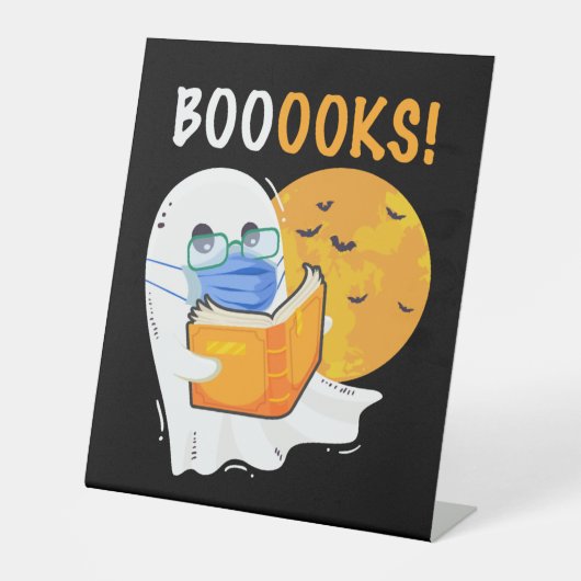 Booooks Halloween Ghost reading books and wearing Sockelschild (Vorderseite)