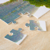 Boot auf einem See. Jig Saw Puzzle (Seite)
