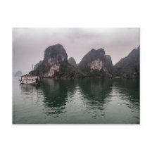 Boot in Misty Halong Bay Rock Islands, Vietnam