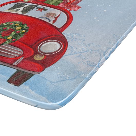 Border Collie Dog in Car mit dem Weihnachtsmann Schneidebrett (Ecke)