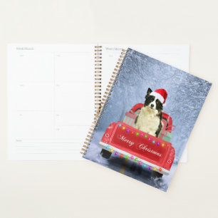 Border Collie Dog in Snow sitzen in Weihnachten Planer