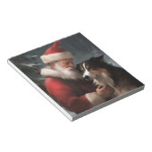 Border Collie mit dem Weihnachtsmann Notizblock (angewinkelt)