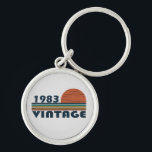Born in 1983 vintage birthday schlüsselanhänger<br><div class="desc">You can add some originality to your wardrobe with this original 1983 vintage sunset retro-looking birthday design with awesome colors and typography font lettering, is a great gift idea for men, women, husband, wife girlfriend, and a boyfriend who will love this one-of-a-kind artwork. The best amazing and funny holiday present...</div>