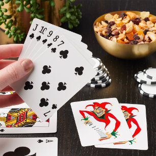 Böser grinsender Narr-Joker mit Jack-in-the-Box Spielkarten