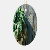 Botanisch grüne Kräuter, die vom Korn des Holzes b Keramikornament (Rechts)