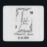 Botanische Monogramm-Verlobung Schneidebrett<br><div class="desc">Mit diesem personalisierten Schneiderbrett, der perfekt für Neuvermählte oder als Jubiläumsgeschenk geeignet ist, stärken Sie Ihre Küchendekoration. Dieses Schnittbrett mit seinem eleganten botanischen Design mit verzierten Eckplänen zeigt die Initialen des Paares, die Namen und das Hochzeitstag schön. Aus hochwertigem Material gefertigt, dient es sowohl als funktionales Küchenwerkzeug als auch als...</div>