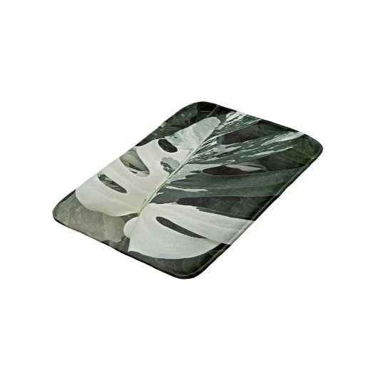 Botanische Pflanze mit variierter Schweizer Käse Badematte (Schrägansicht)