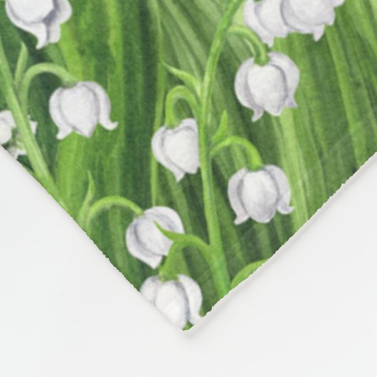 Bouquet der Lilie des Tals Blume auf rosa Fleecedecke (Ecke)