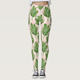 Bouquet der Lilie des Tals Blume auf rosa Leggings