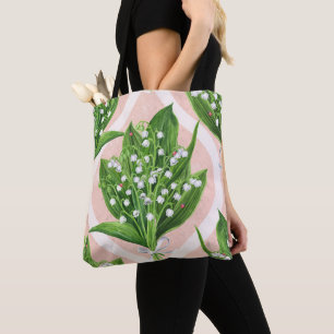 Bouquet der Lilie des Tals Blume auf rosa Tasche