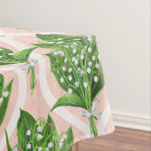 Bouquet der Lilie des Tals Blume auf rosa Tischdecke (Beispiel)