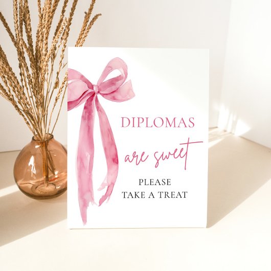 Bow-Diplome sind süß und nehmen eine Leckerei Absc Sockelschild