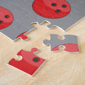 Bowlingkugel trifft Kegel mit Ballmuster Puzzle (Seite)