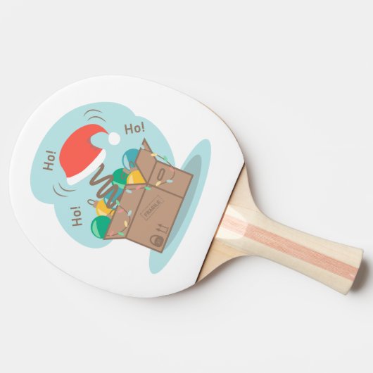 Boxbox mit Weihnachtsdekoration und Weihnachtsmann Tischtennis Schläger (Seitenansicht)