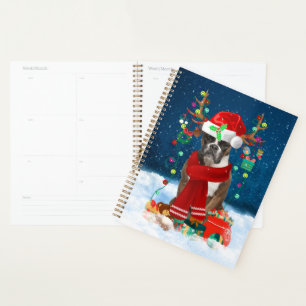 Boxerhund mit Weihnachtsgeschenken Planer
