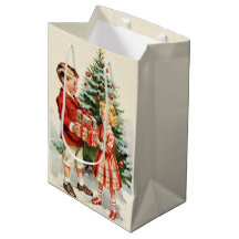 Boy and girl giving each other Christmas presents