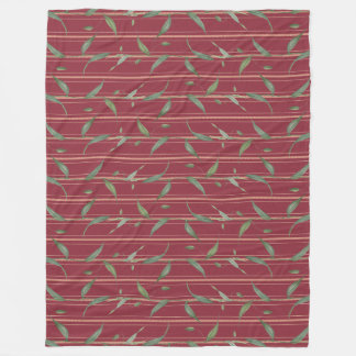 Branch of leaves on red wallpaper fleecedecke