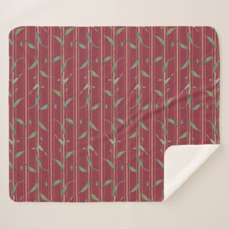 Branch of leaves on red wallpaper sherpadecke