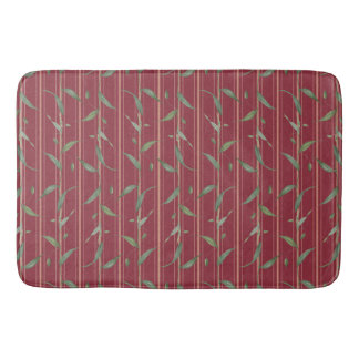 Branch of leaves on red wallpaper shower curtain badematte