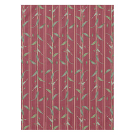 Branch of leaves on red wallpaper tischdecke
