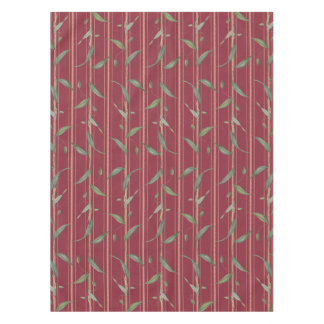 Branch of leaves on red wallpaper tischdecke