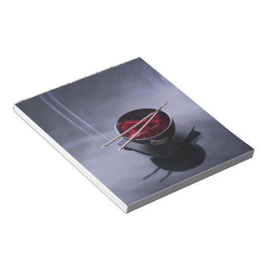 Brand auf der Schüssel mit Blättern Notizblock (angewinkelt)