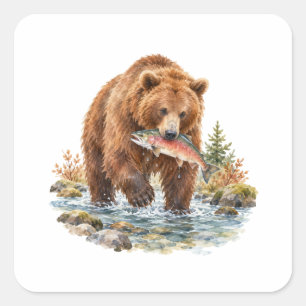 Braunbär fischt in einem Bach Quadratischer Aufkleber