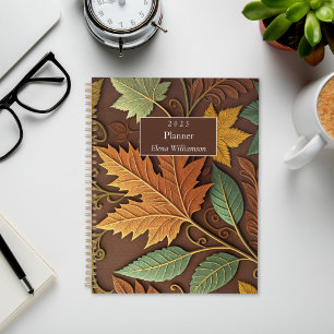Braune, goldene und grüne Herbstblätter Planer