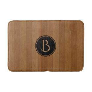 Braune Holzplatten mit Monogramm Badematte