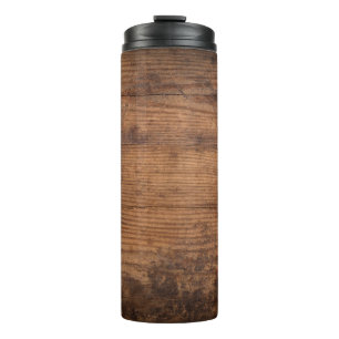 Braune Holzstruktur. Abstrakter Hintergrund, leere Thermosbecher