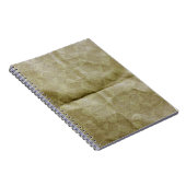 Braune Papierfalte. Mach das Papier kaputt. Hinter Notizblock (Rechte Seite)