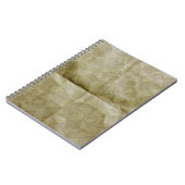 Braune Papierfalte. Mach das Papier kaputt. Hinter Notizblock (Linke Seite)