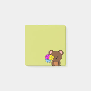 Brauner Bär mit einem Haufen Blume Post-it Klebezettel
