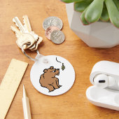 Brauner Bär mit fallendem Herbstleaf Niedliche Tie Schlüsselanhänger