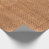 Brauner Juteleinwandhintergrund oder Sackleinen Geschenkpapier (Ecke)