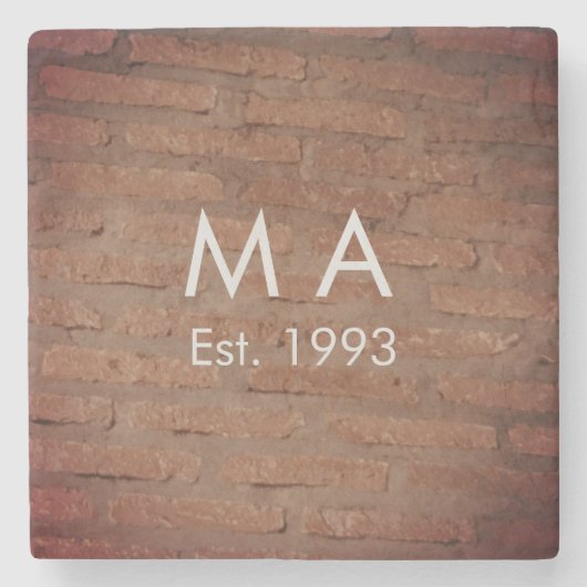 Brauner rustikaler Stein mit dem Namen Datum des J Steinuntersetzer (Vorderseite)