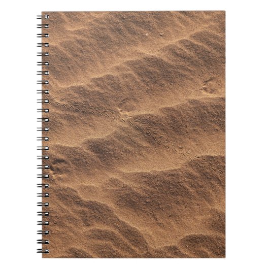 Brauner Sand mit Wasser tagsüber Notizblock (Vorderseite)