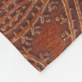 Braunes Leder, gearbeitete Blumenmuster. Fleecedecke (Ecke)