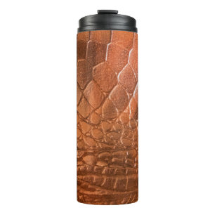 Braunes Leder mit einem Muster in Form eines Scal Thermosbecher